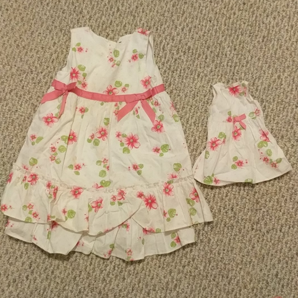 Matching floral sundresses for girl and baby doll